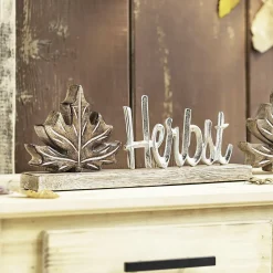 Herbstliche Dekofiguren|Frank Handels GmbH & Co. KG Schriftzug 